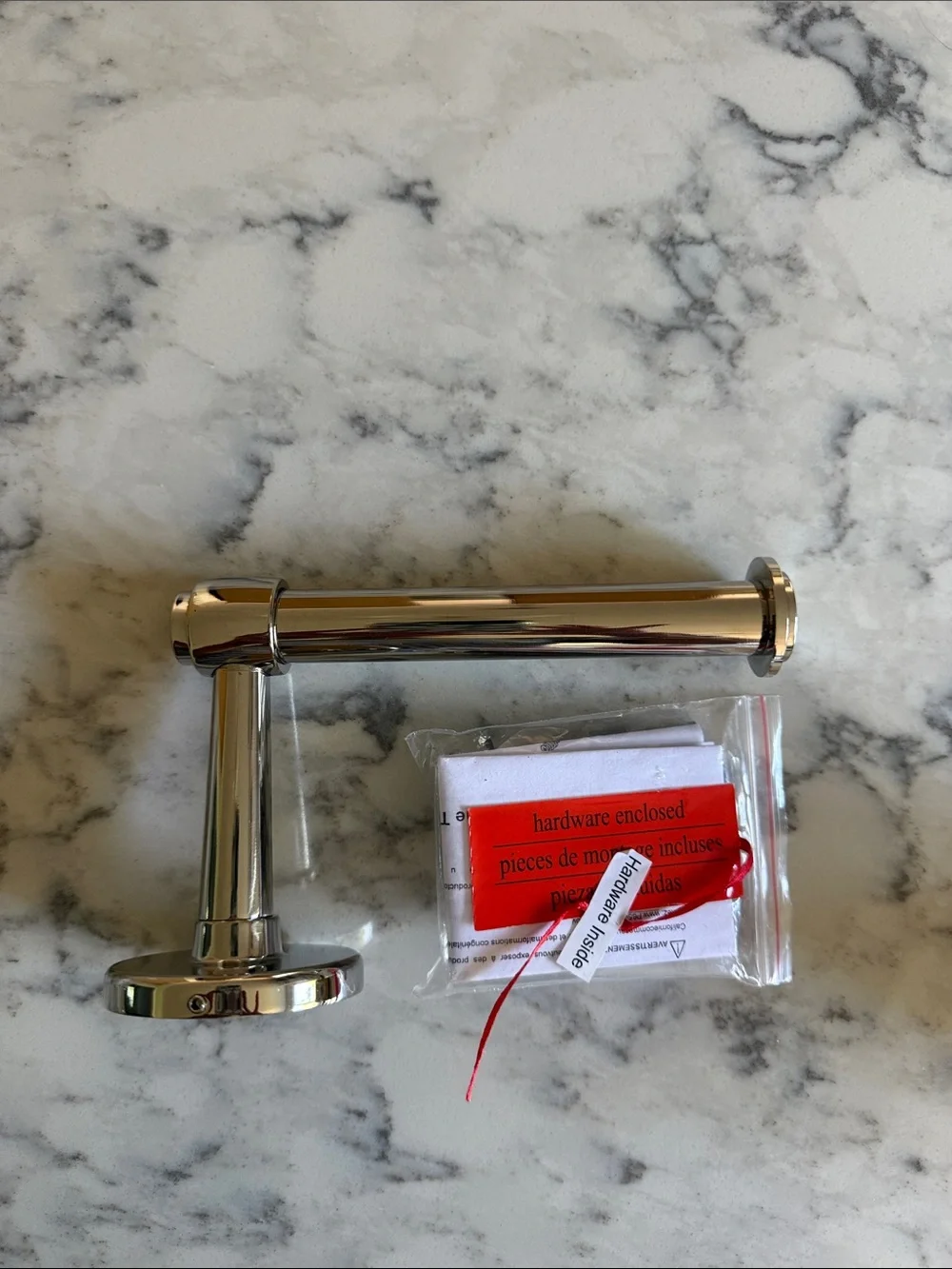 Polished nickel Toilet Paper Holder - Sleek Wall-Mount   Sansome Pottery Barn